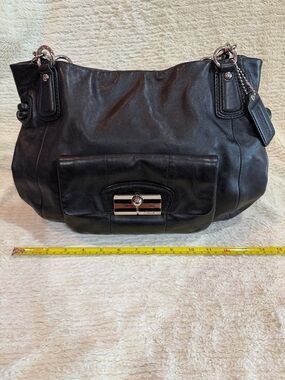 Coach Black Leather Shoulder Bag with Front Flap and Silver Hardware